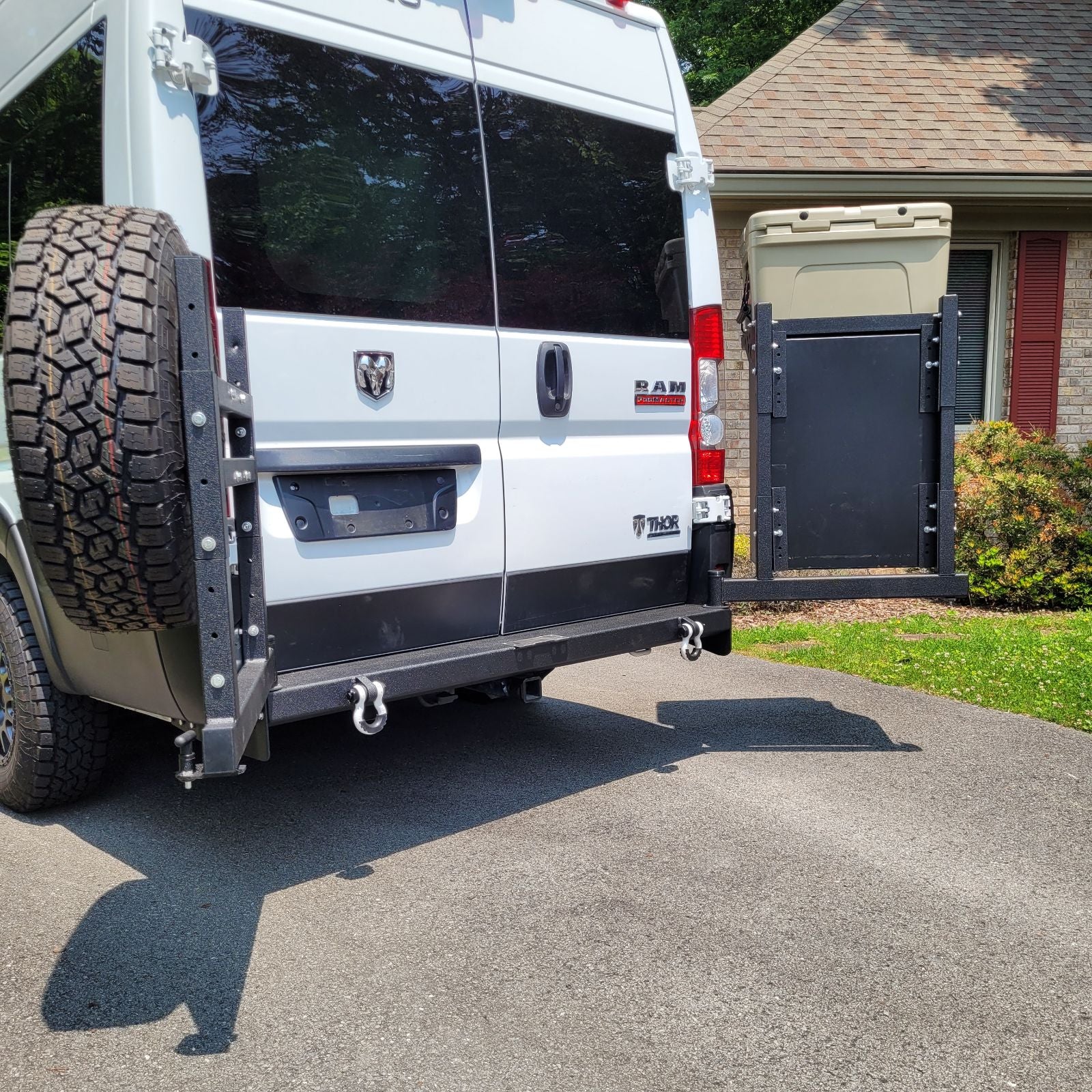 AAREYS Swing Arm Bumper for Ram Promaster with swing-out arms.