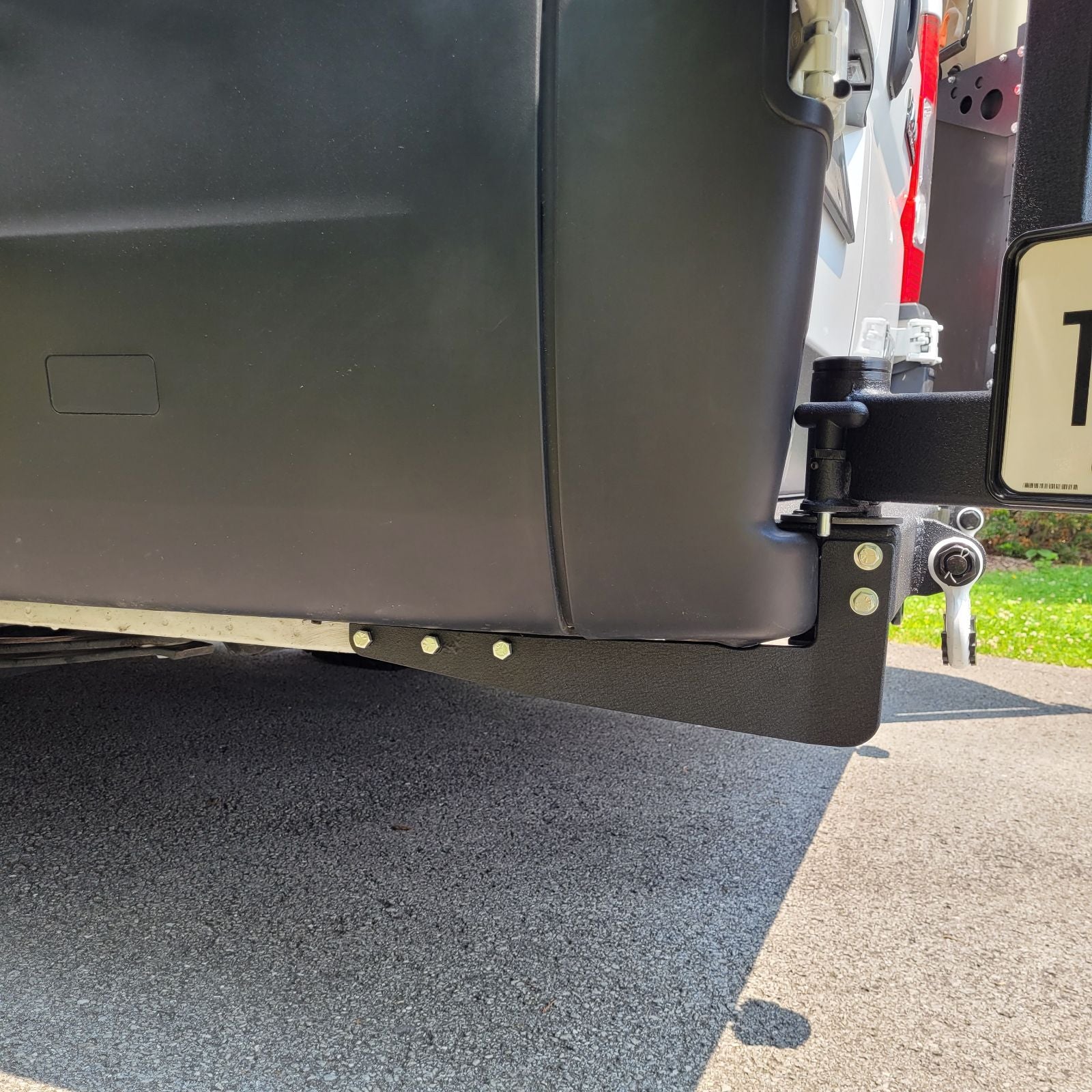 AAREYS Swing Arm Bumper for Ram Promaster with swing-out arms.